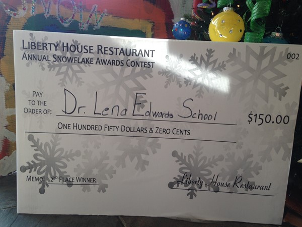The prize! $150.00 goes to DLEACS ART DEPARTMENT for their hard work.
