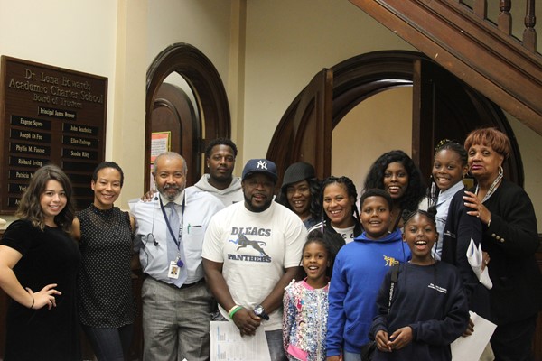Principal Brewer with Dr. Turner, Nicole Calegari along with students and parents