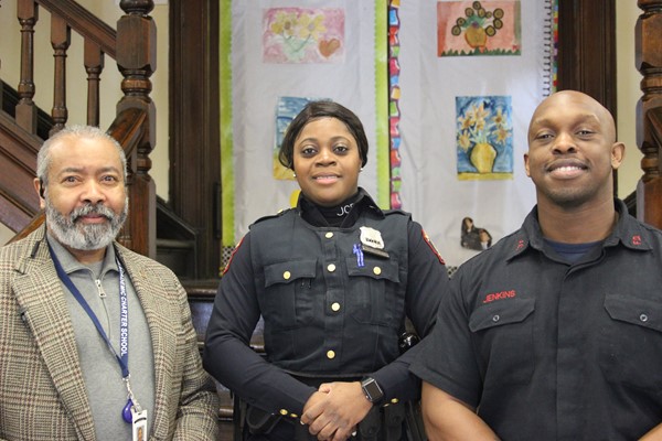 Principal Brewer with Jersey City's finest! JCPD Officer Putnam and JC Fire Fighter Jenkins