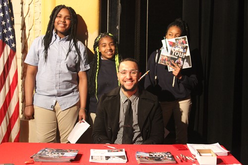 Rutgers Tevin Resse with students