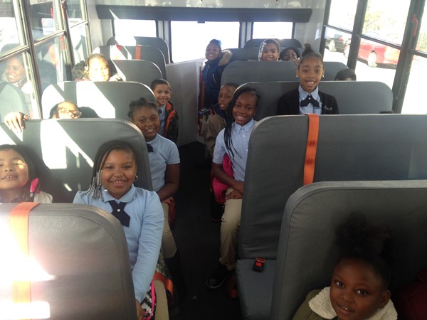 Eighteen students make up the team in grades 1-4, here they are aboard the bus at DLEACS.